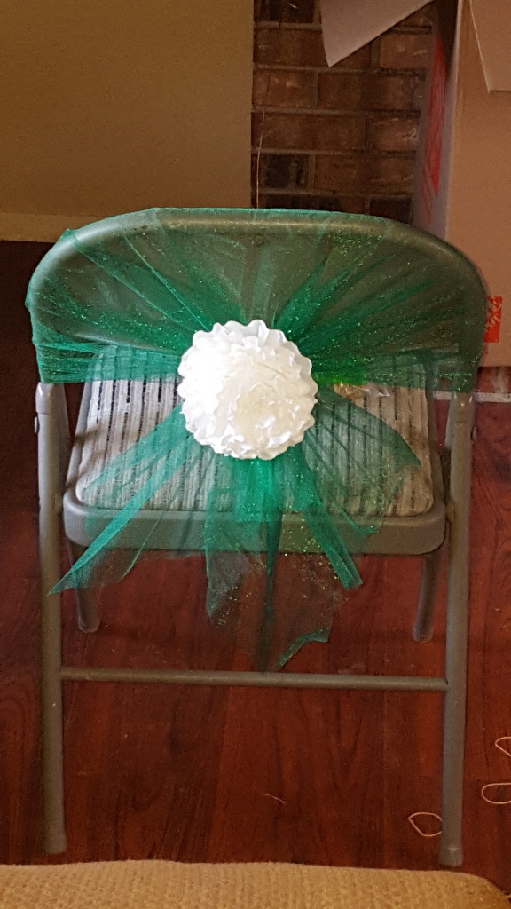 chair cover with white coffee filter flower