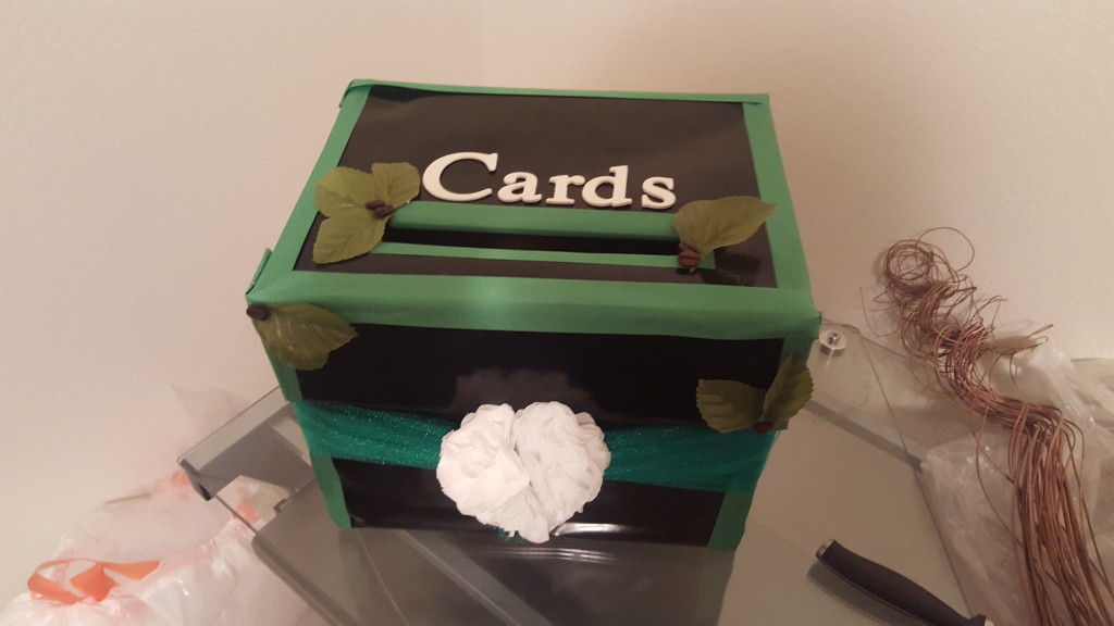 the card box, made with tulle, coffee filter flowers leaves, and coffee beans
