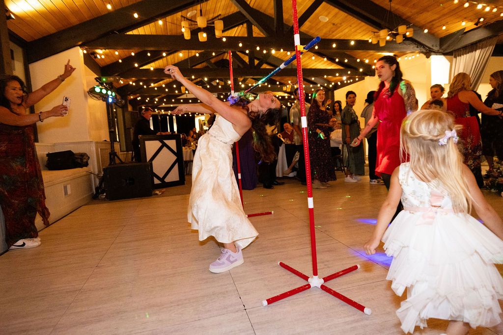 Guests participating in limbo during wedding reception in Reno Nevada